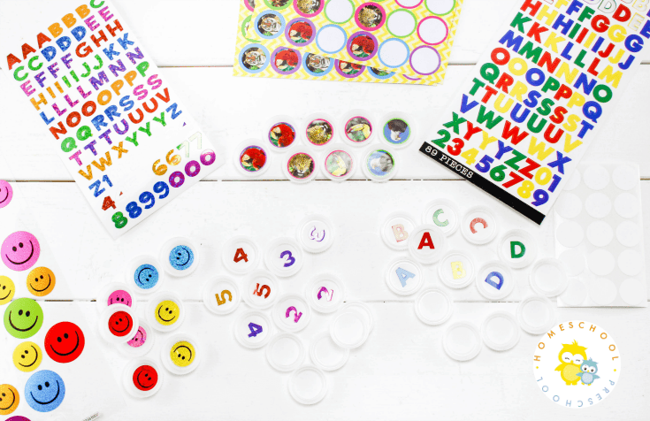 Come discover how to set up a low prep math game for preschoolers. All you need is some number stickers and some plastic bottle caps.