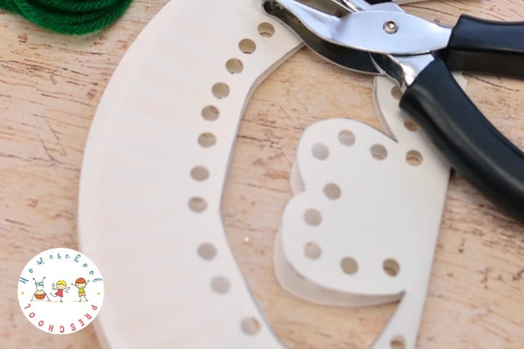 Your little crafters will love this St Patricks preschool shamrock craft! They'll build hand strength and motor skills with this fun lacing craft.