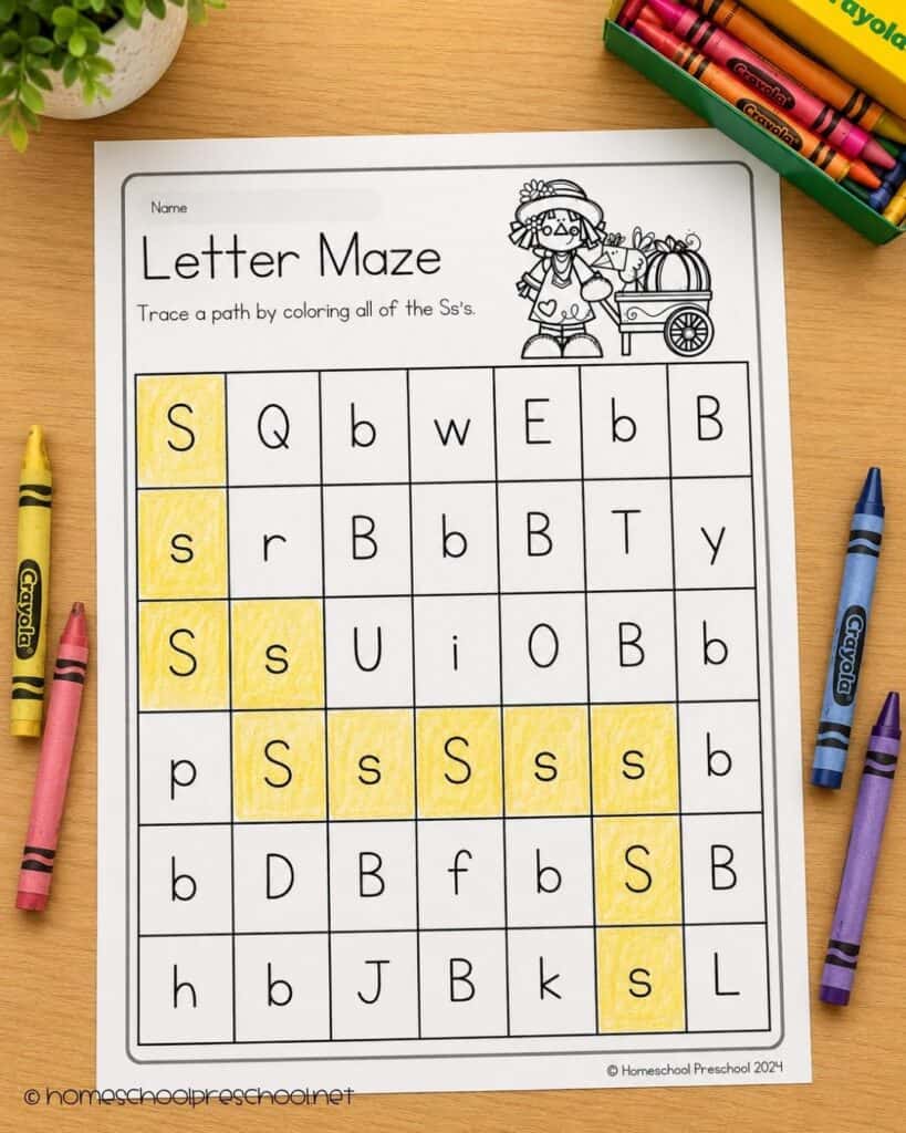 Scarecrow letter recognition maze for preschoolers featuring uppercase and lowercase letter S identification as children color a path through the worksheet.
