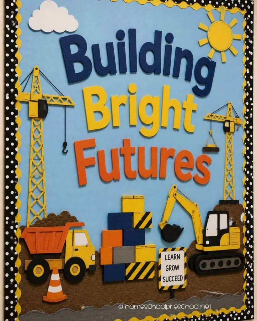 Building Bright Futures preschool bulletin board with construction trucks, cranes, building blocks, and the words "Building Bright Futures."