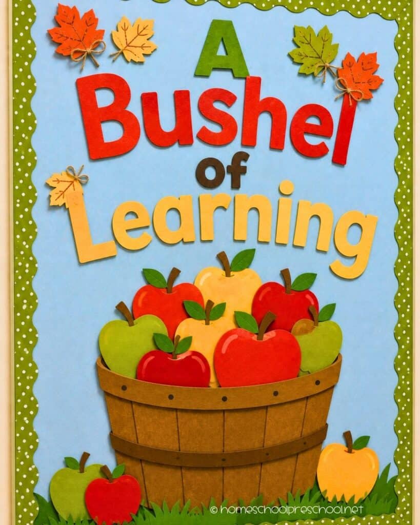 A Bushel of Learning preschool bulletin board with a basket of colorful apples, autumn leaves, and the words "A Bushel of Learning."