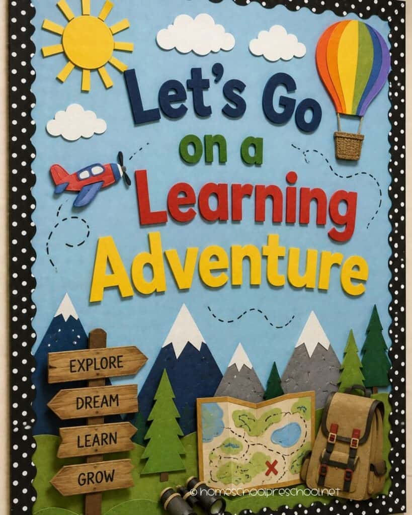 Let's Go on a Learning Adventure preschool bulletin board with mountains, a hot air balloon, backpack, map, airplane, and the words "Let's Go on a Learning Adventure."