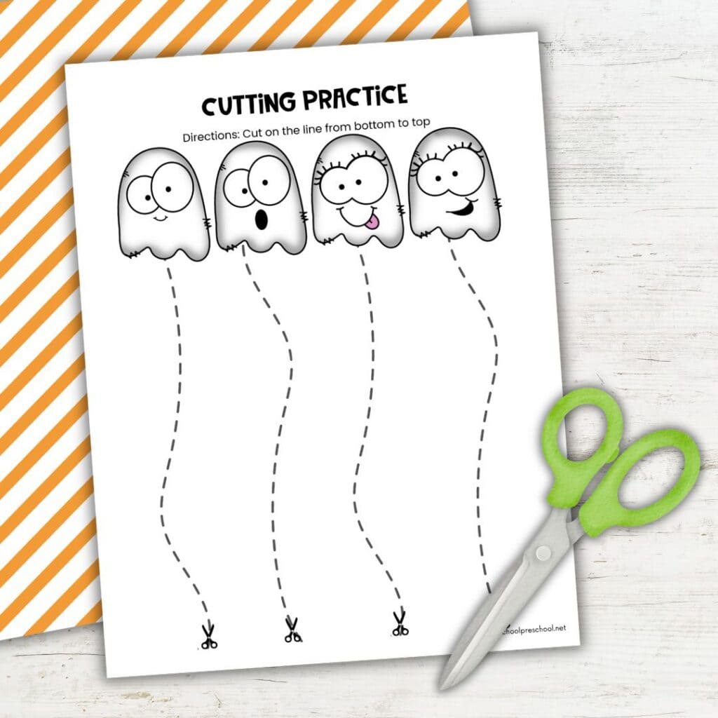 Halloween cutting practice page for preschoolers featuring four gently curved dashed paths leading from scissors icons to cartoon ghosts.