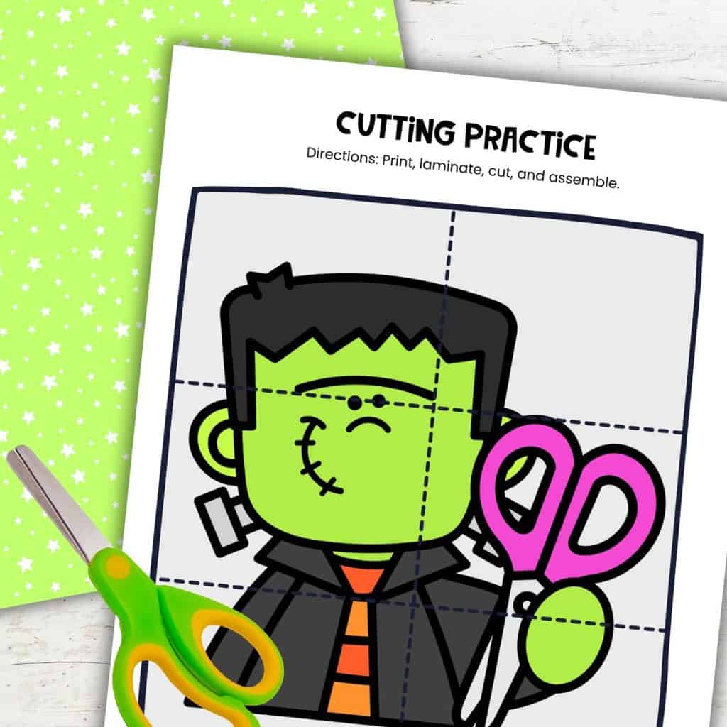 Frankenstein cut-and-assemble activity for preschoolers featuring a colorful picture divided by cutting lines for scissor practice.